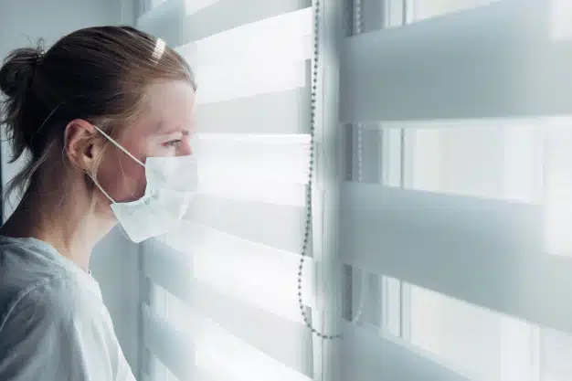 Sad woman protective medical mask
