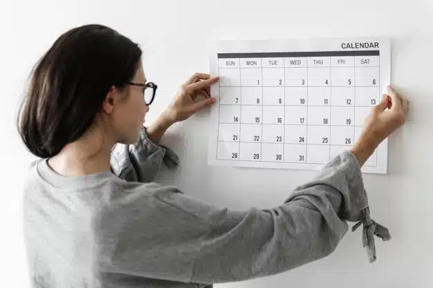 Woman checking calendar