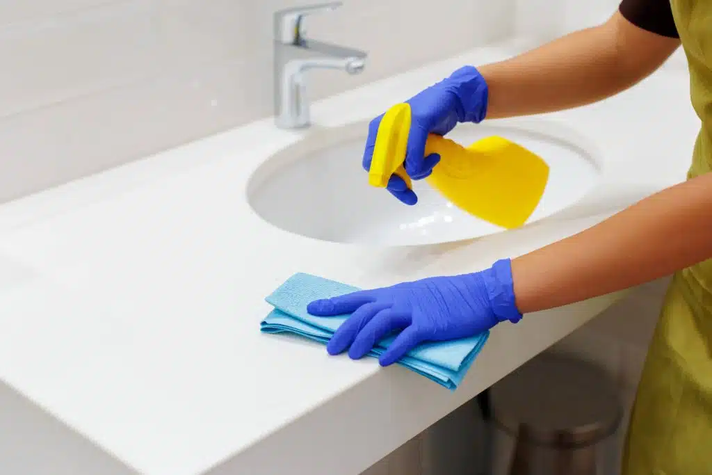 Housekeeper cleaning a hotel room