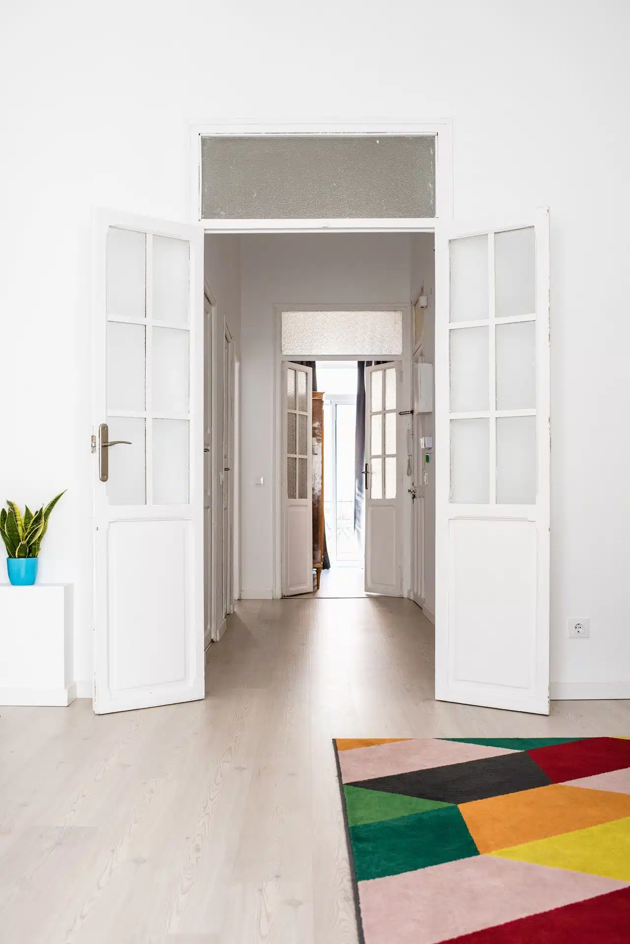 Large white open plan home with bi-fold doors