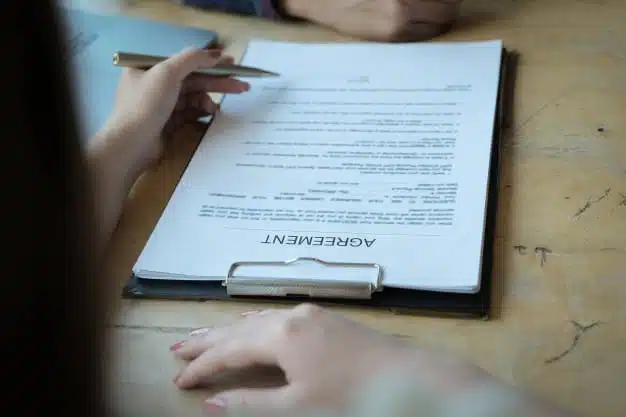 bank officers discussing customers sign contract