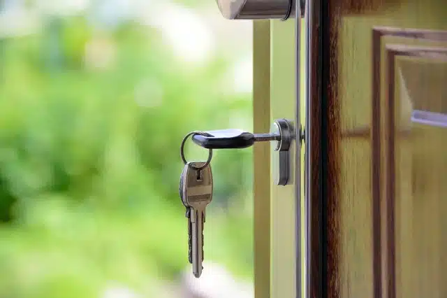 A picture of a key inside a front door