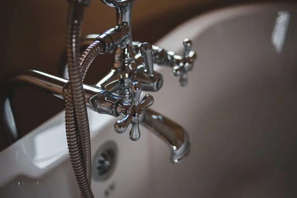 Stainless steel shower head and shower temperature knobs