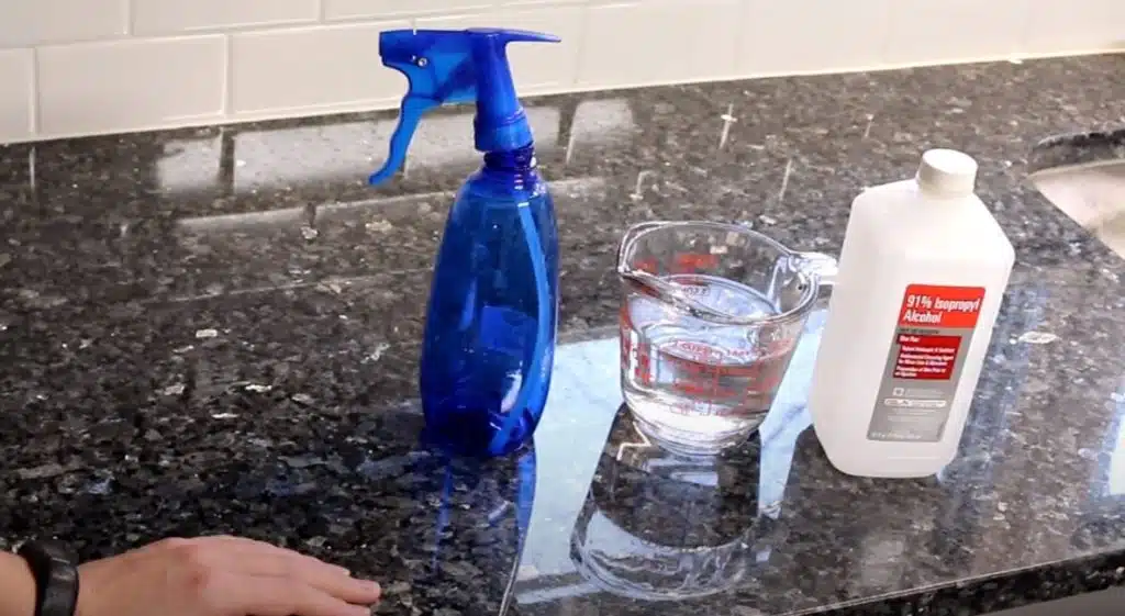 Granite kitchen benchtop with cleaning materials