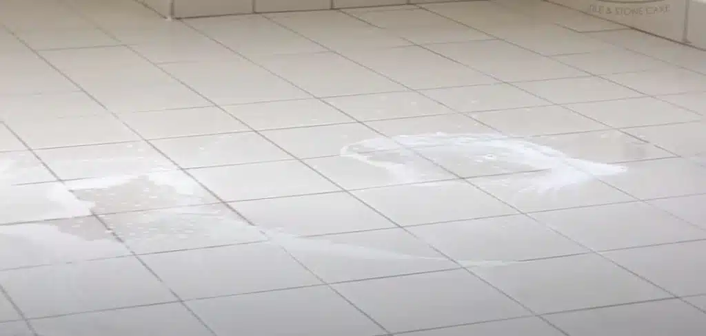 Wet white porcelain tile floor