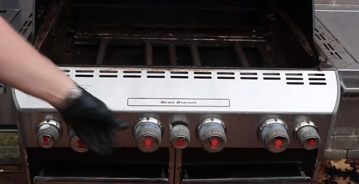 A Weber Barbeque grill during the cleaning process