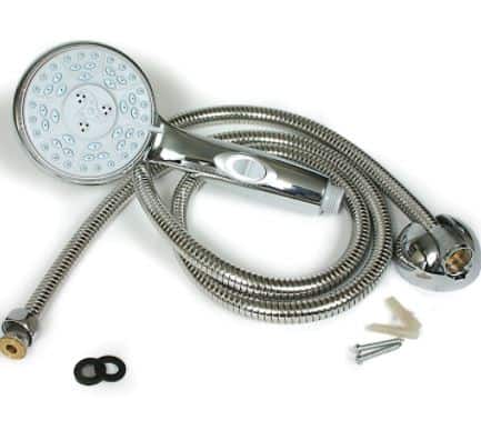 shower head parts sitting on a white tabletop
