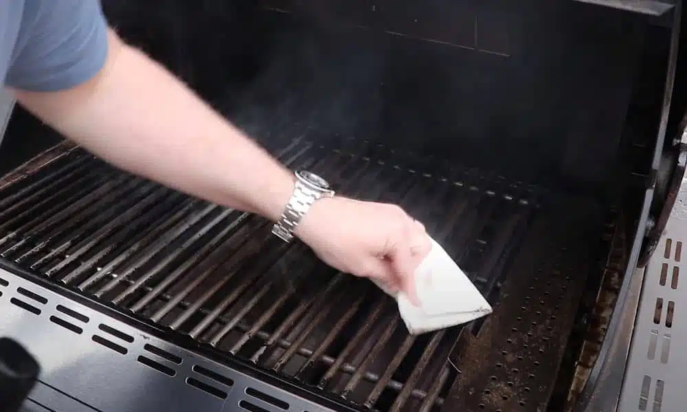 the final step of the barbeque grill cleaning process