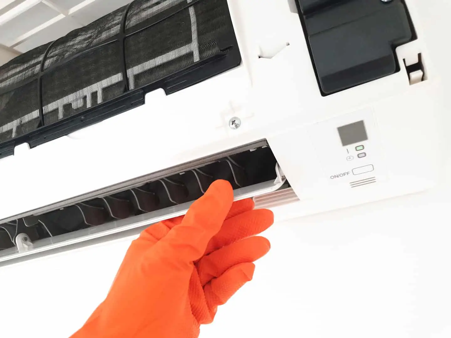 Modern airconditioner unit service cleaning the filter to preven