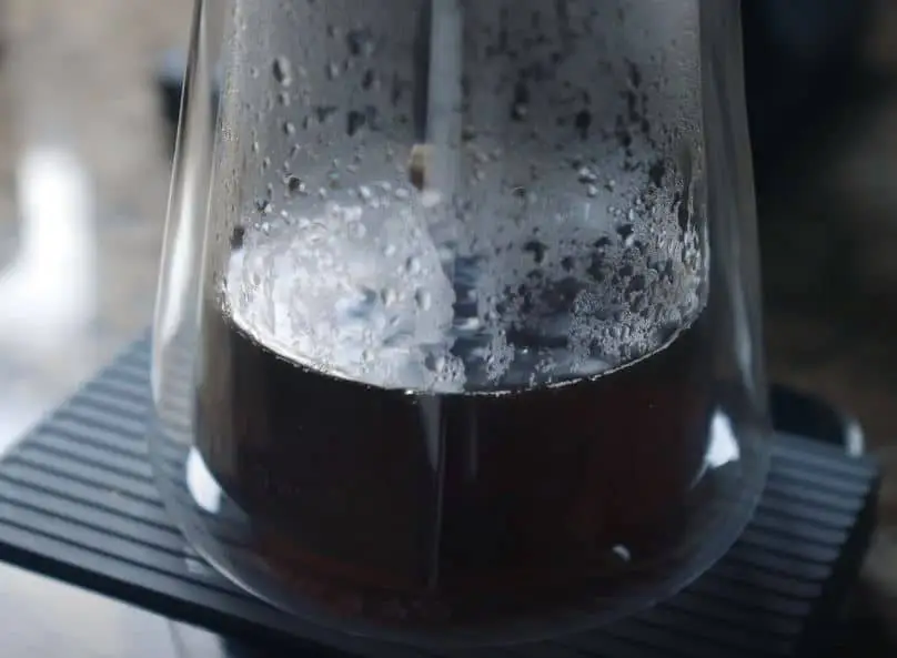 coffee carafe being used to brew coffee