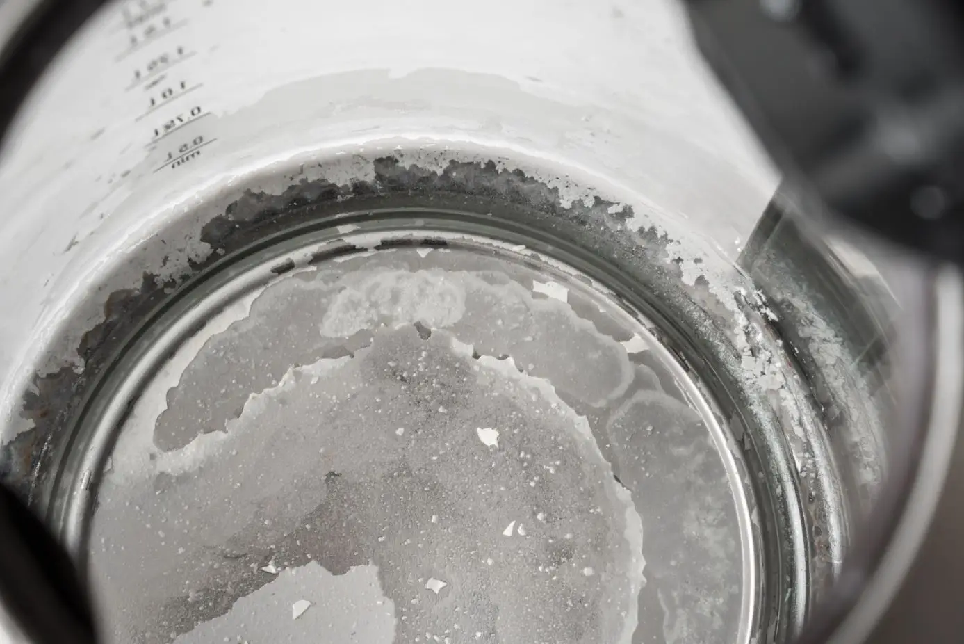 heavy limscale build up in the bottom of a see-through kettle
