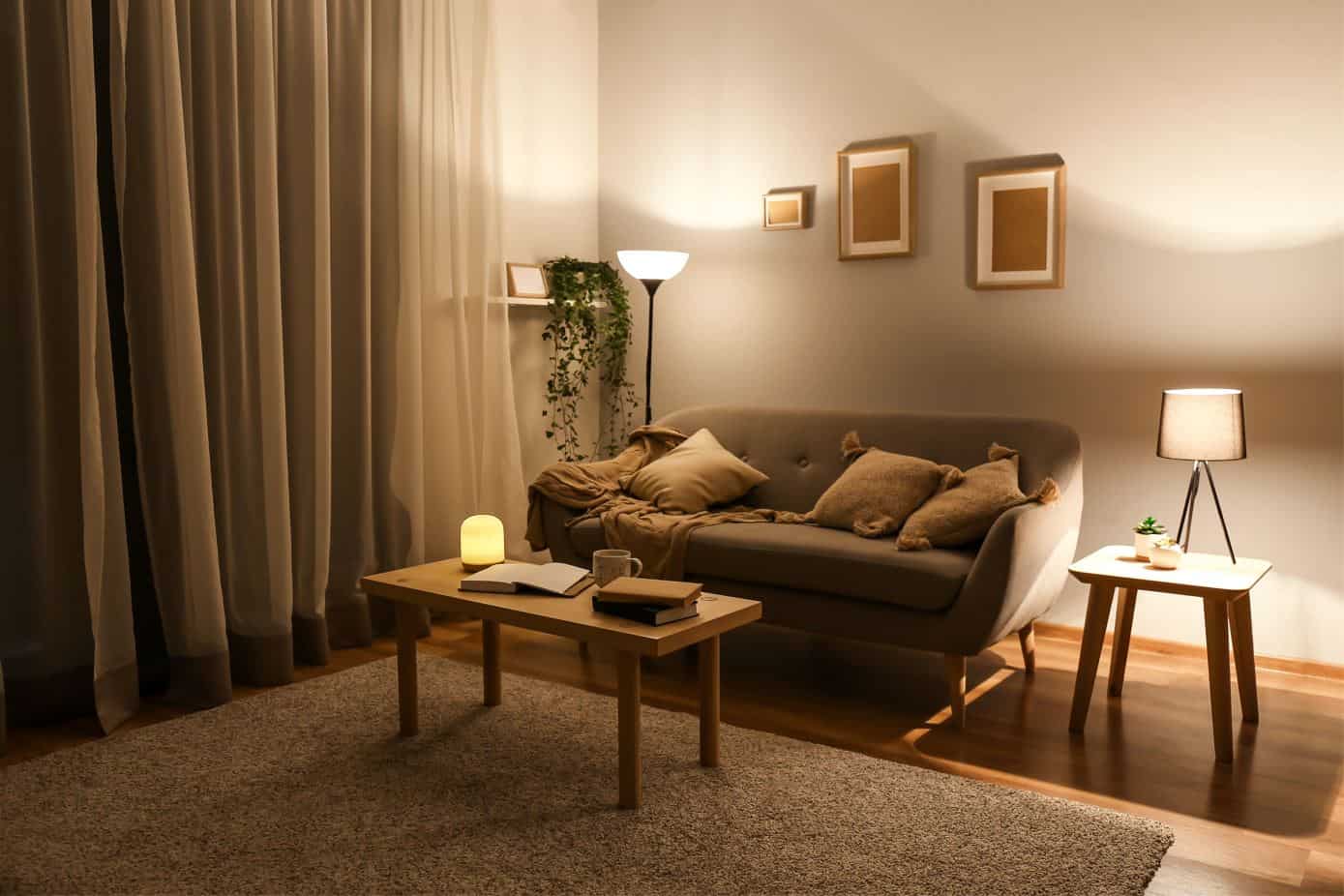 modern brown inspired living room with a large two seater grey sofa