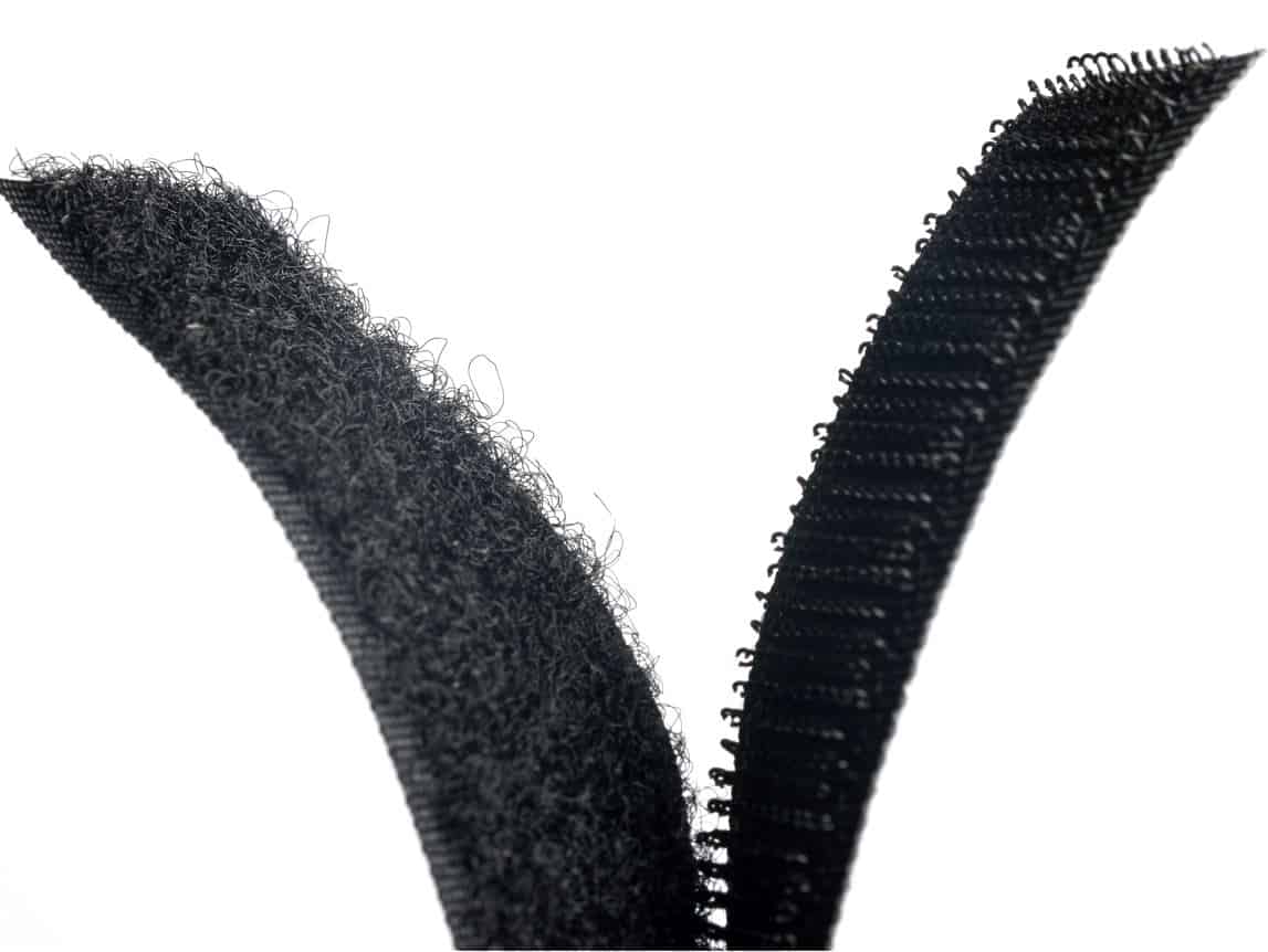 horizontal black velcro strap on a white background