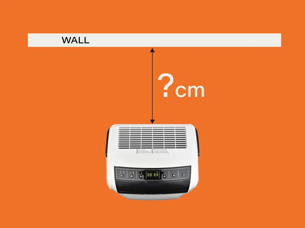 dehumidifier illustration demonstrating how close to wall a dehumidifier should be