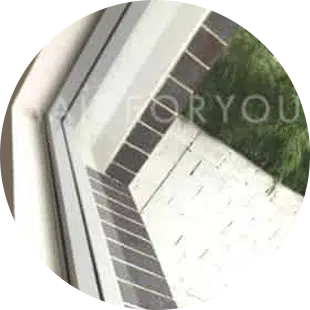 Pictures of a clean window and window sill after it has been cleaned