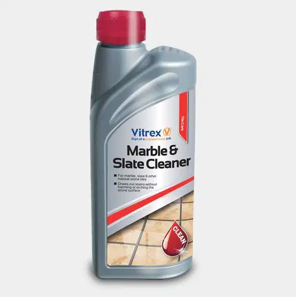 a bottle of vitrex marble and slate cleaner on a gray background