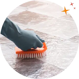 Juan carlos, maidforyou cleaner using a hard bristled brush to clean natural stone tile