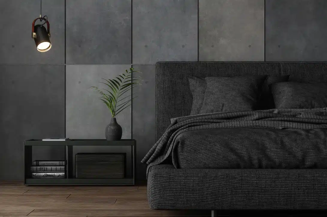 modern matte black inspired bedroom with a large kingsize bed in the background