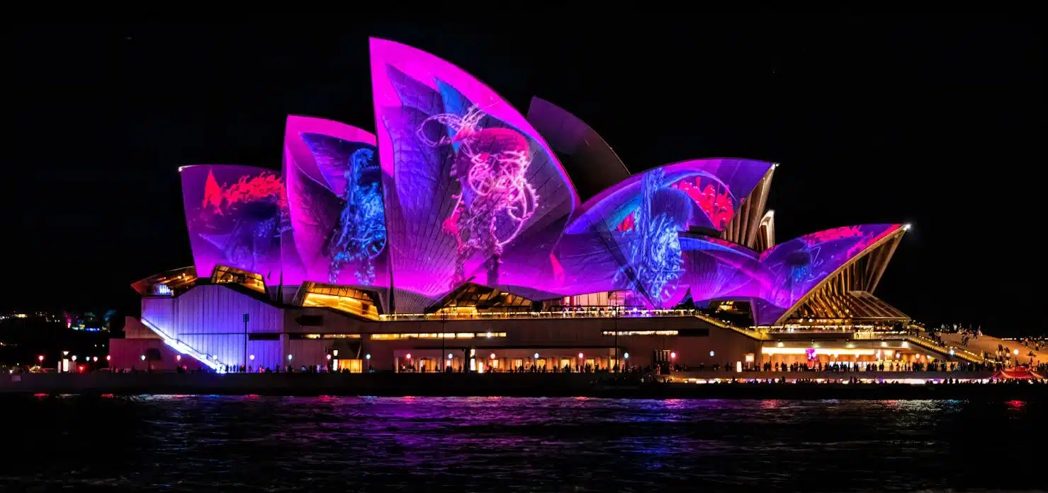 Sydney Opera House at night time illuminated during the Sydney Vivid Light Festival