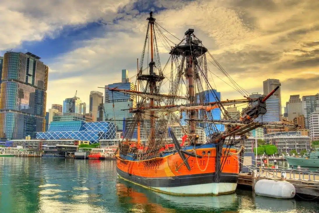 large old ship docked next to Sydney Maritime Museum