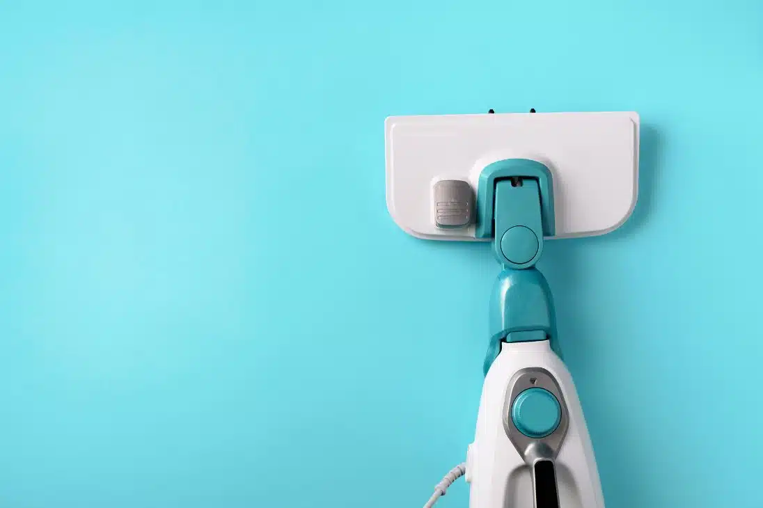 close up of generic steam mop head on a blue background