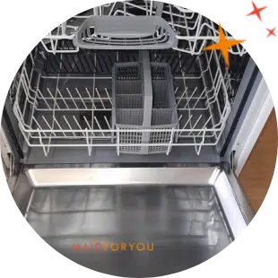 The interior of a stainless steel dishwasher after being cleaned