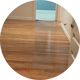 timber wood floor in a large empty living room after being cleaned