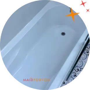 close up of brand new bathtub with custom tiled floor
