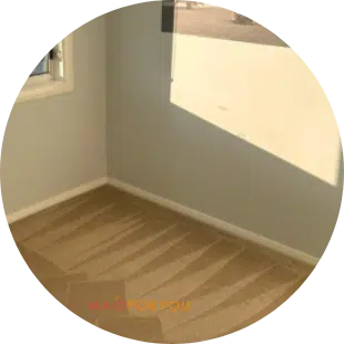 Brown carpet displaying wand marks following a steam cleaning session.