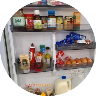 Close-up of refrigerator shelves post cleaning and decluttering.
