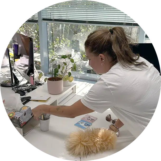 Maidforyou cleaner cleaning an office desk