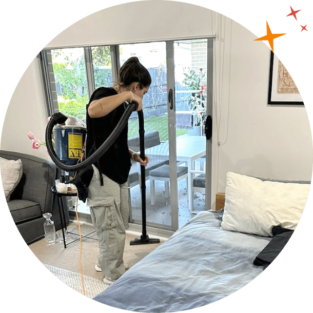 Maidforyou cleaner vacuuming living room floor