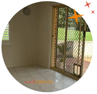 After cleaning photo of a large dining area next to sliding door